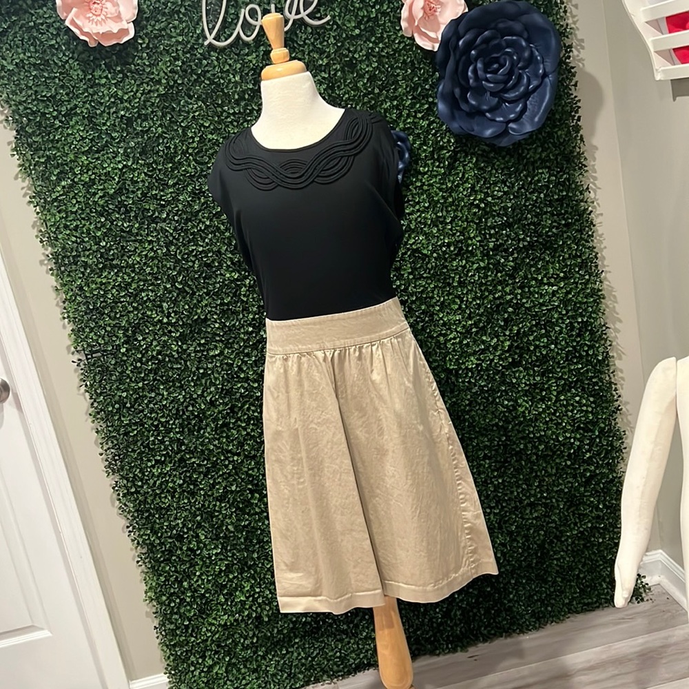 Casual dress with soft black top and khaki skirt